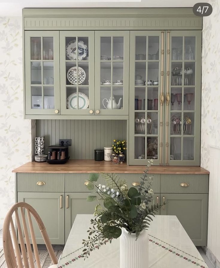 sage cottage shaker kitchen cabinet ideas in small kitchenette with reeded panel cabinets and glass doors