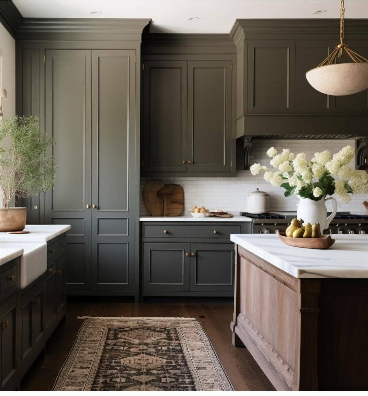 deep olive green shaker kitchen cabinets with wood island and brass hardware