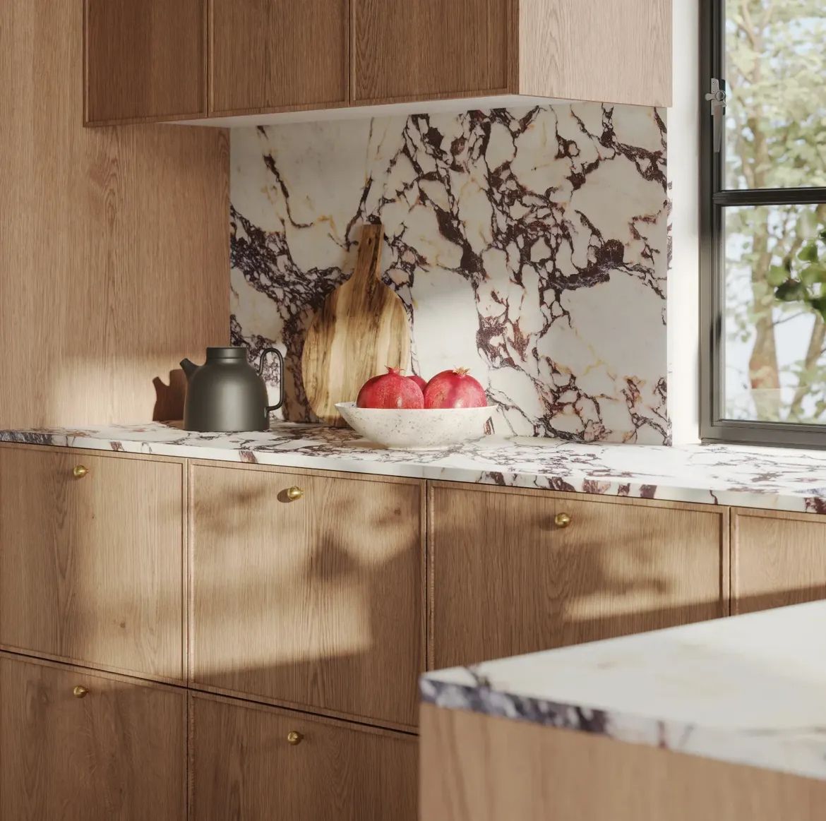 Slim shaker cabinet doors in natural wood with dramatic marble backsplash and brass hardware in modern kitchen.