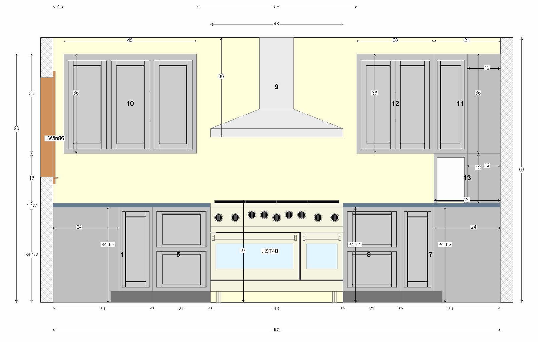 The center wall in an U-shaped kitchen layout design.