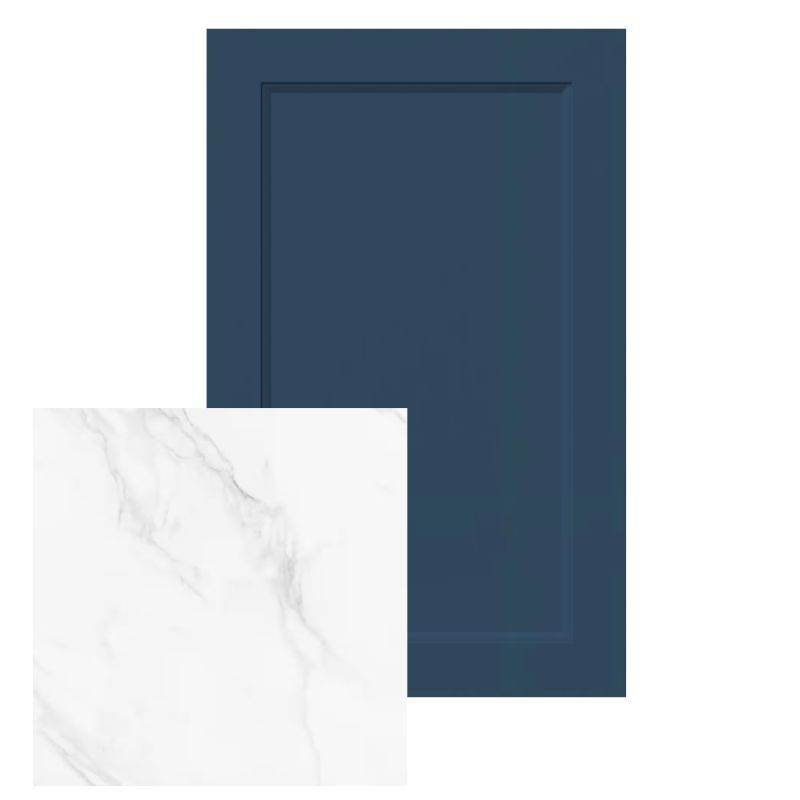 A blue shaker ogee cabinet door paired with a white marble countertop, blending traditional detailing with modern contrast for a refined kitchen design.