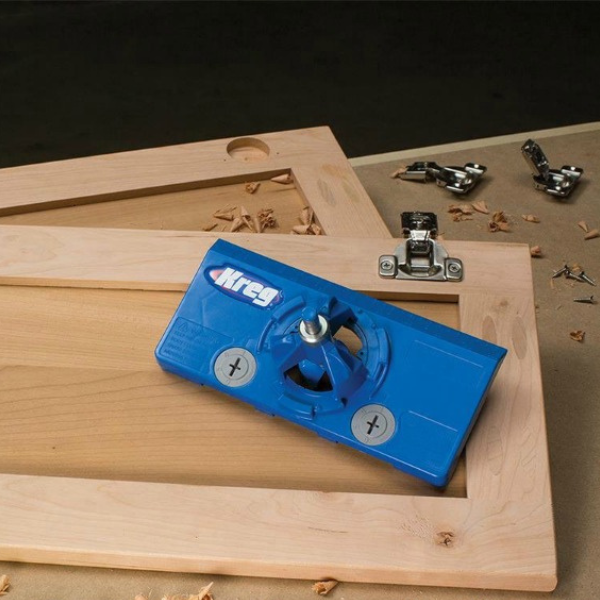 Cabinet door hinge bore hole drilling for concealed European hinges on a replacement cabinet door.