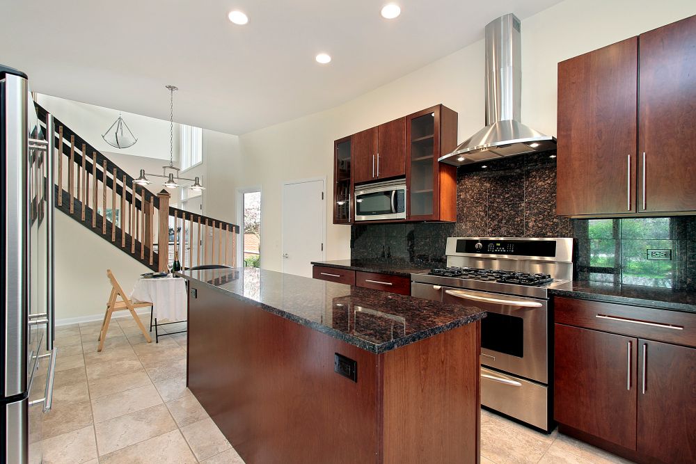 Dark wood open space kitchen 