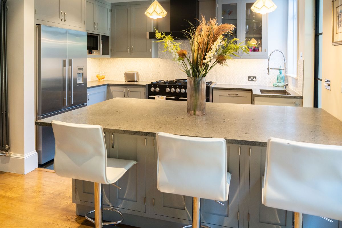 Grey kitchen with stone countertops