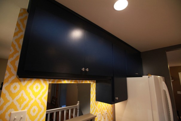 Cabinets painted navy blue.