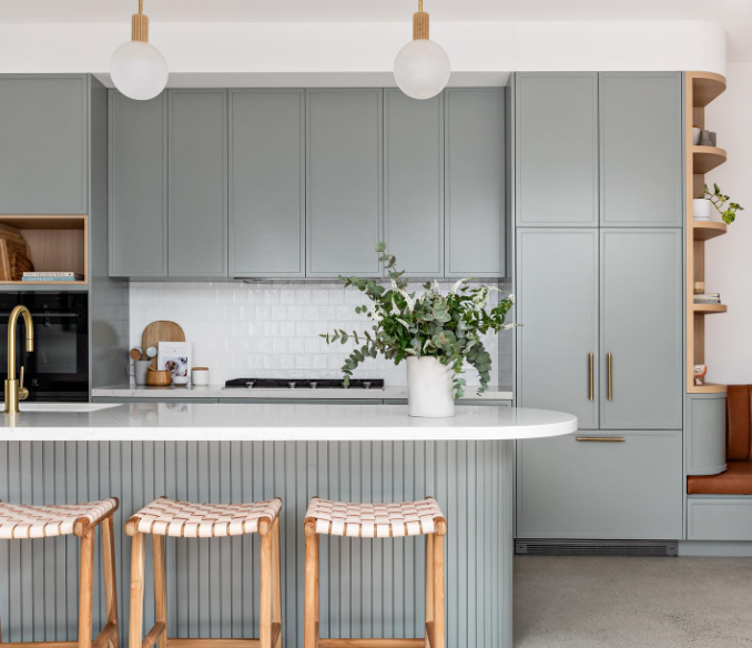 light gray fluted cabinet doors in modern kitchen