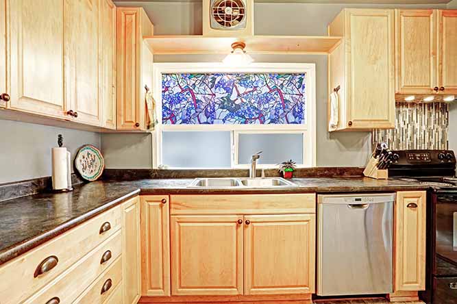 natural finished kitchen cabinets