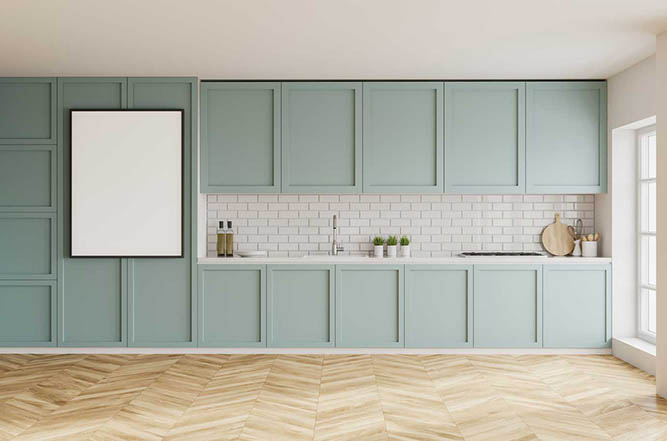 An open concept kitchen with large cabinet doors.