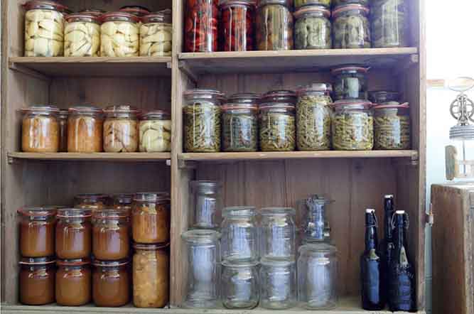 Open shelves filled with jars 