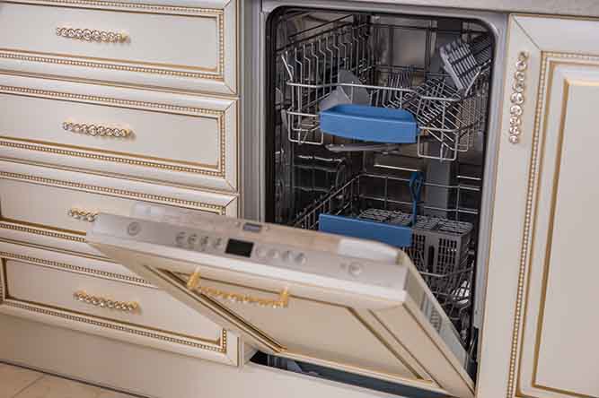 A panel ready dishwasher with an ornate cover