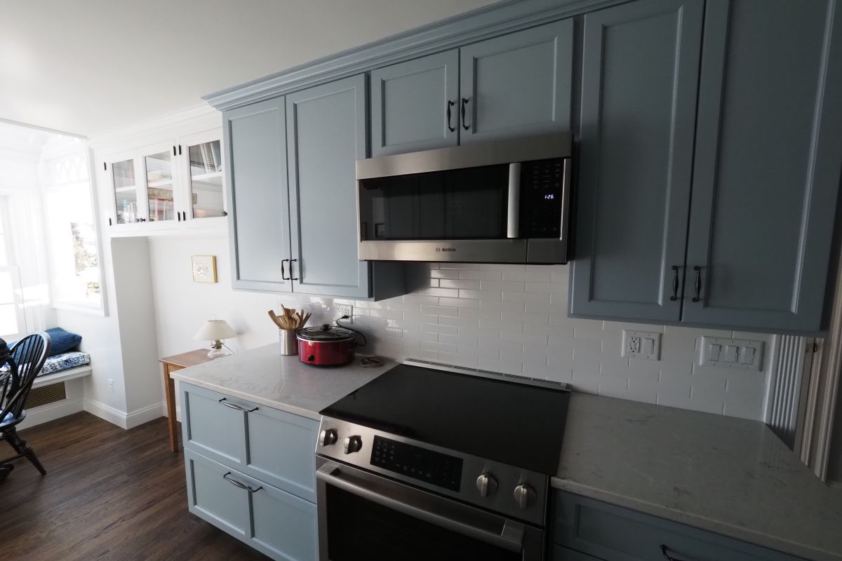 kitchen cabinets transitioning to sunroom