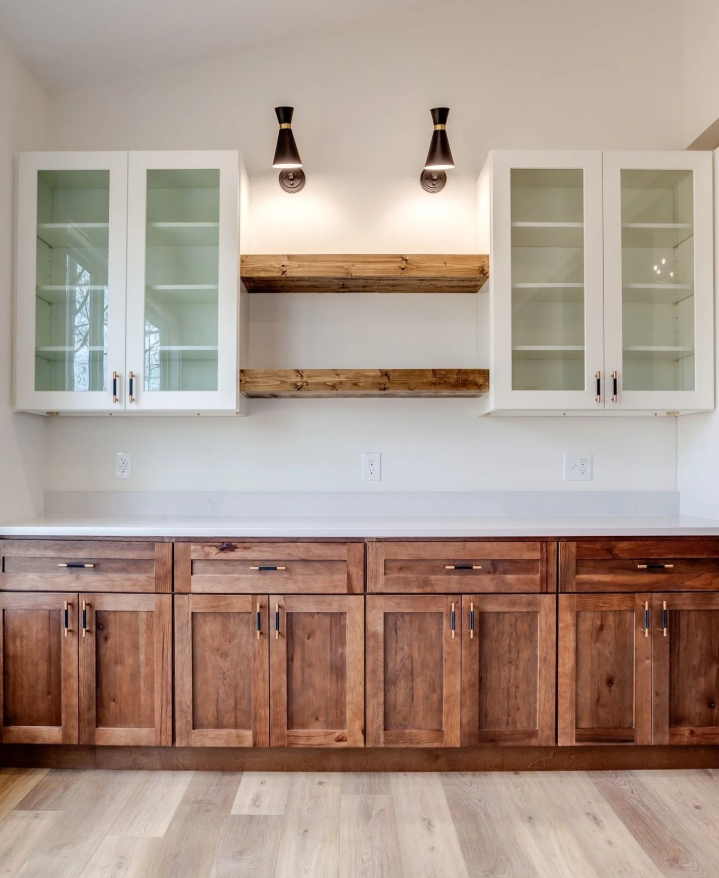 Rustic Hickory Kitchen Built-Ins with Open Shelving Rustic hickory kitchen built-ins with white glass-front cabinets, floating wood shelves, and custom storage.