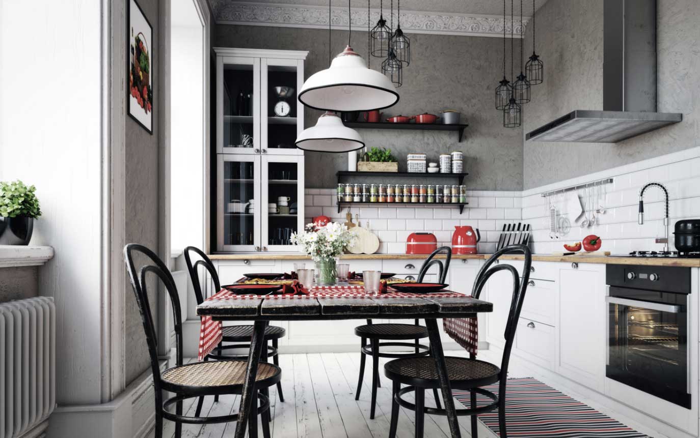 A small kitchen with white cabinets. 