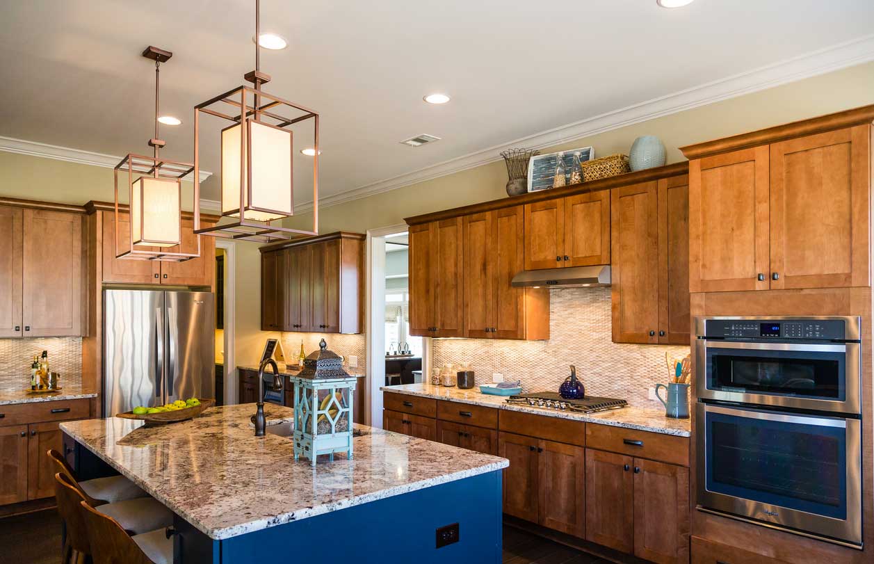 A kitchen in natural wood tones.