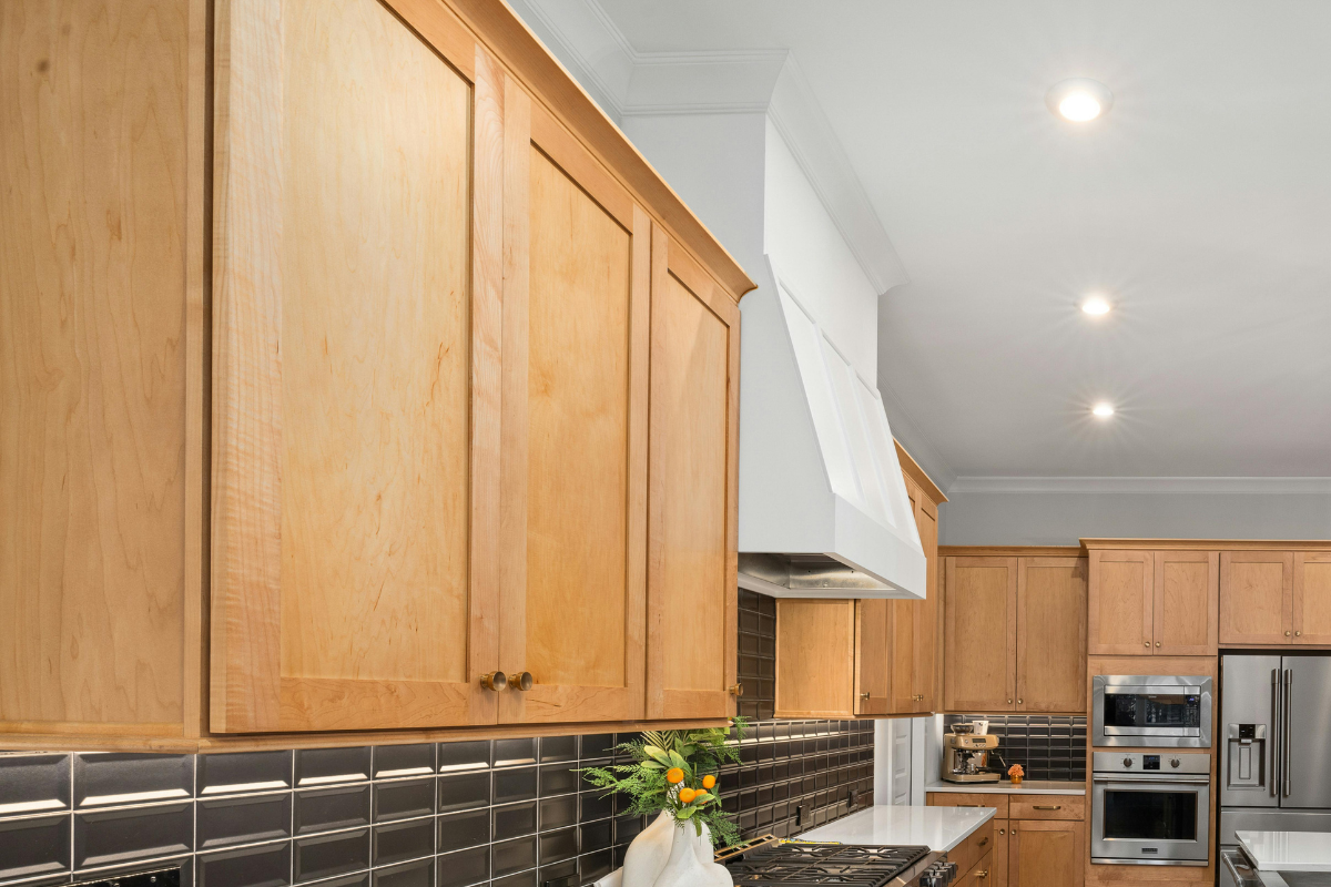 Unfinished shaker cabinet doors in natural wood ready for staining or painting