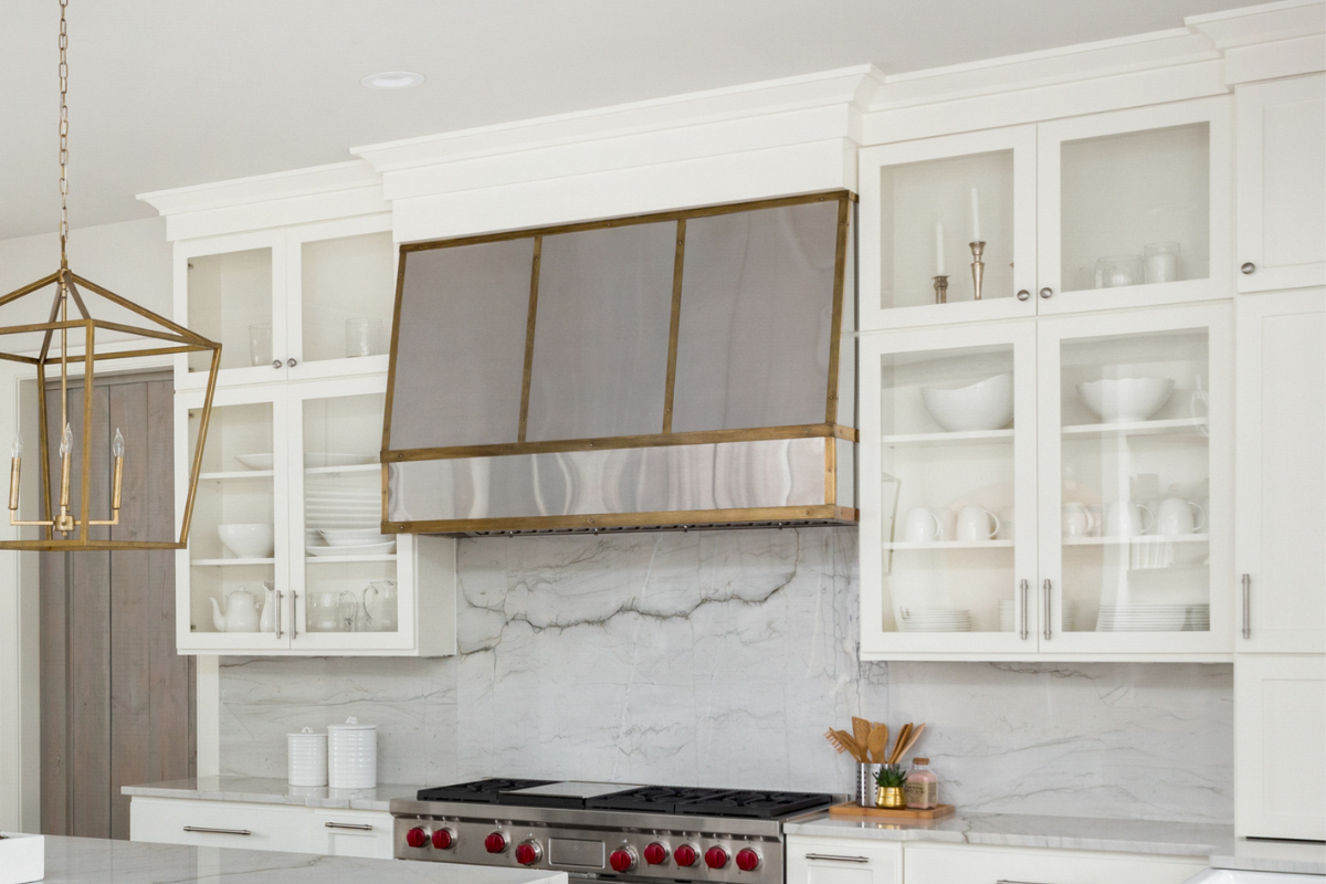 White glass shaker cabinet doors with clear panels in a modern kitchen
