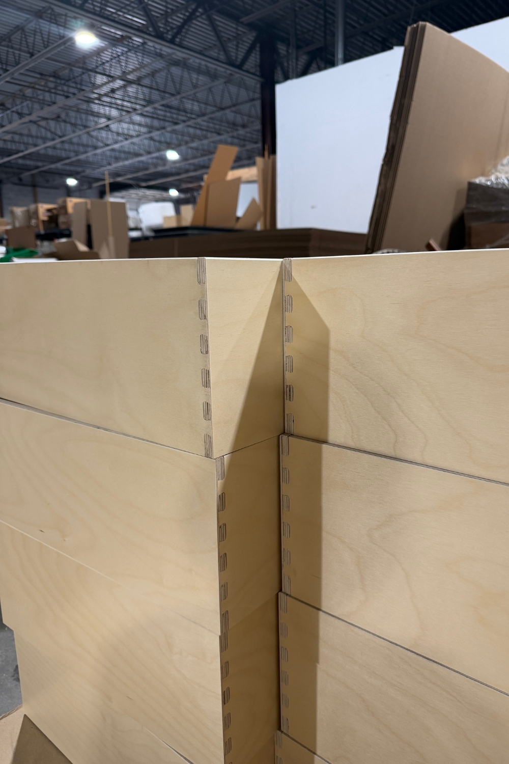 stacked custom drawer boxes with dovetail joints showing replaceable drawer box construction