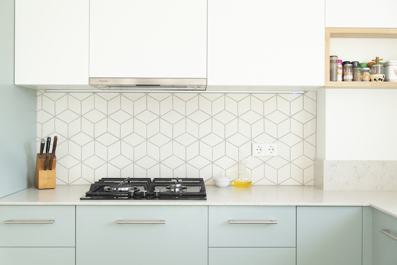 A two-tone kitchen with full-overlay thermofoil cabinet doors. 